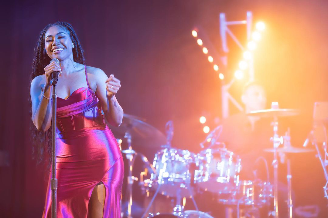 Paulini performing live on stage